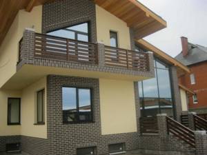 фасадные панели для наружной отделки дома из бруса